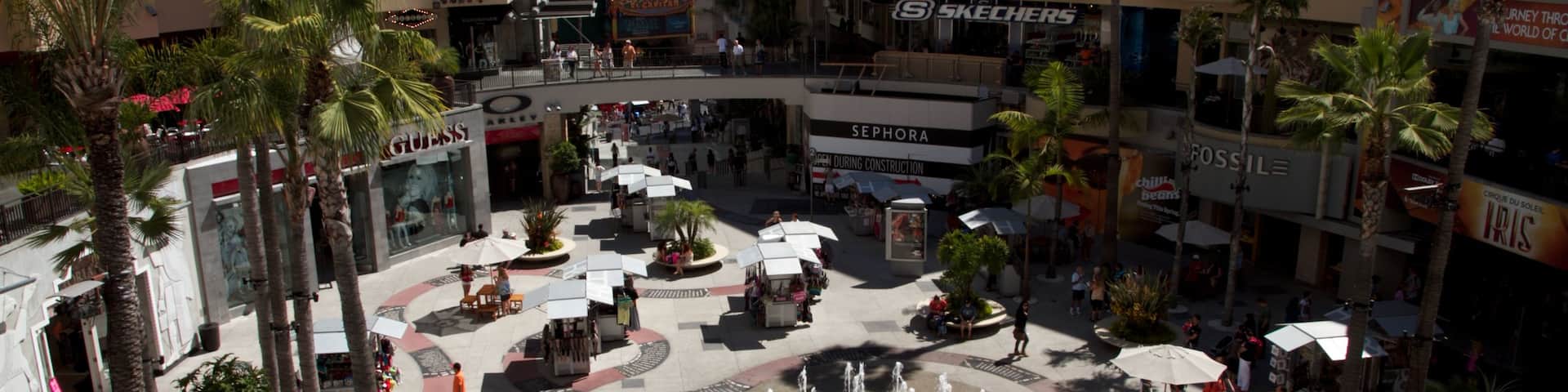 Hollywood Walk of Fame featuring a fountain and a city