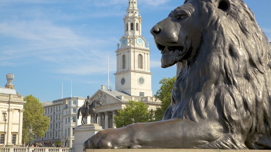 Londres que incluye una estatua o escultura, un parque o plaza y una ciudad
