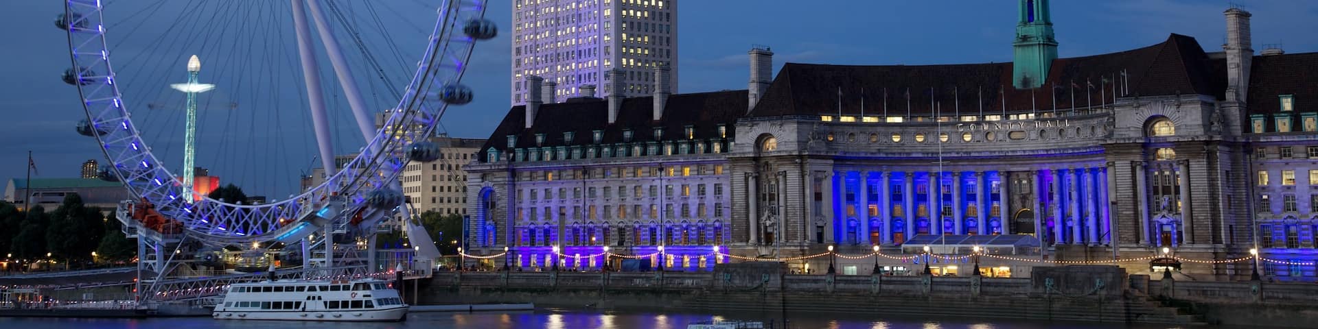 London Eye qui includes rivière ou ruisseau, building et scènes de nuit