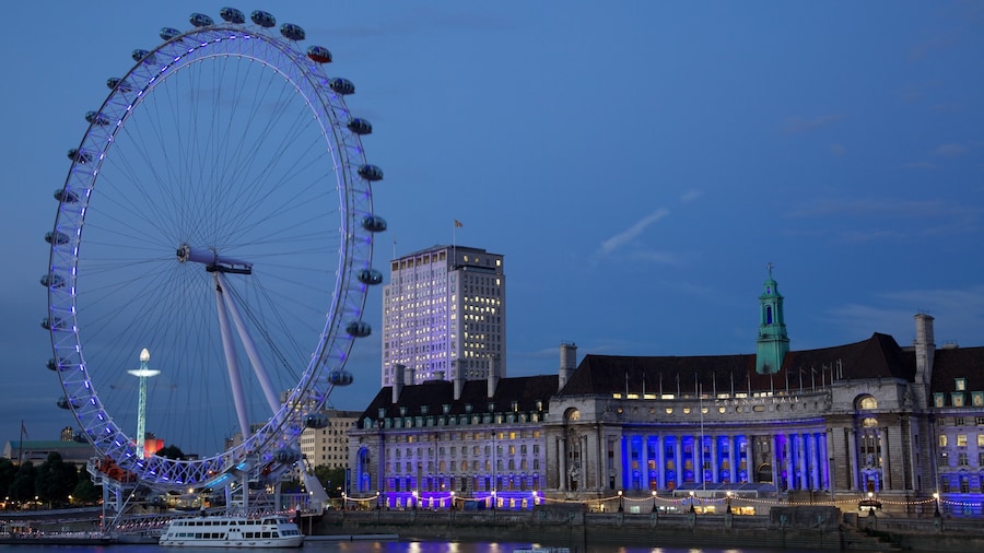 London Eye featuring a skyscraper, modern architecture and a river or creek
