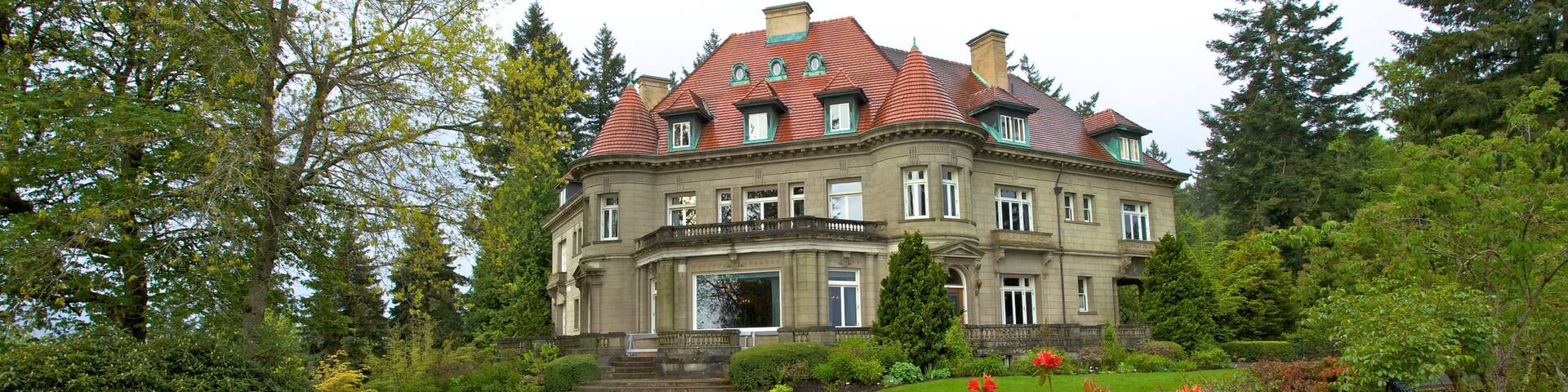Pittock Mansion which includes flowers, heritage architecture and a garden