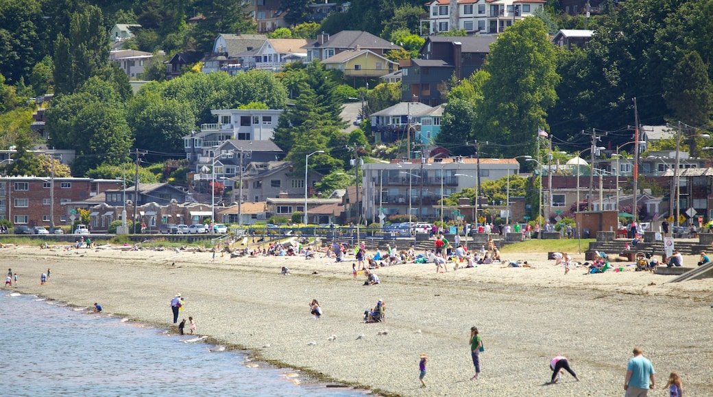 Alki Beach featuring a city and a sandy beach