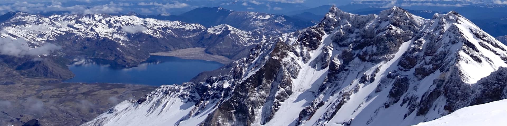 Mount St. Helens which includes snow and tranquil scenes