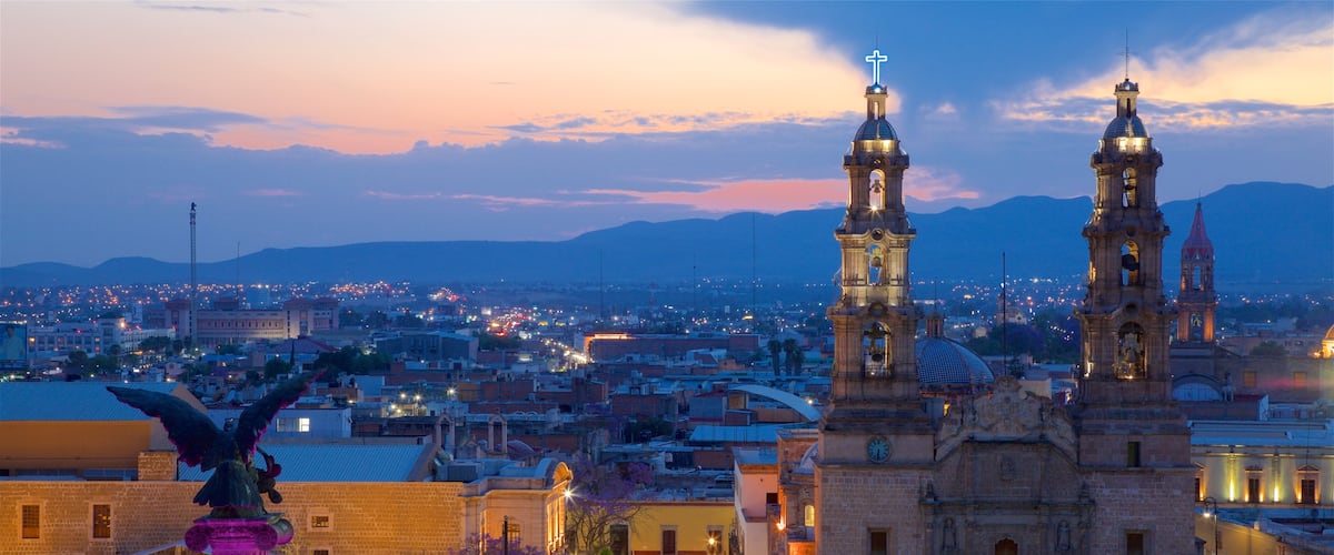 Aguascalientes featuring a sunset, a city and landscape views