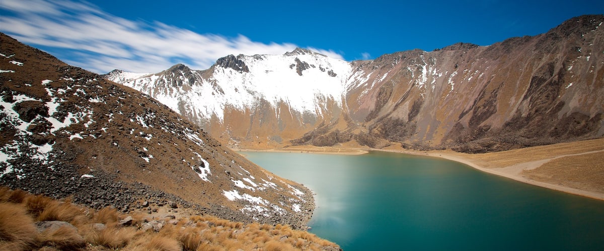 Toluca which includes mountains, snow and a lake or waterhole