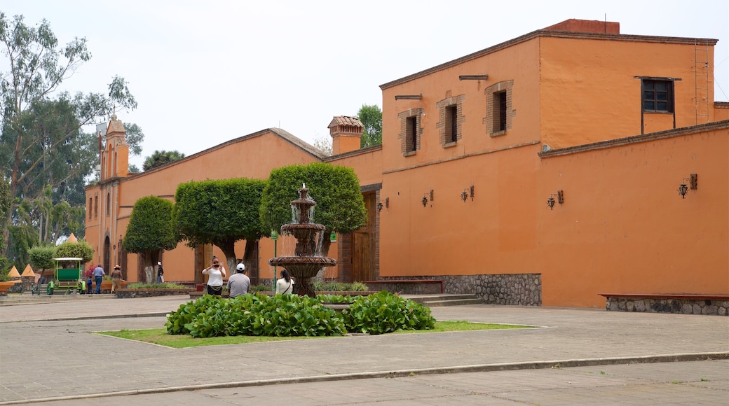 Zacango Zoo which includes a fountain, a church or cathedral and heritage architecture