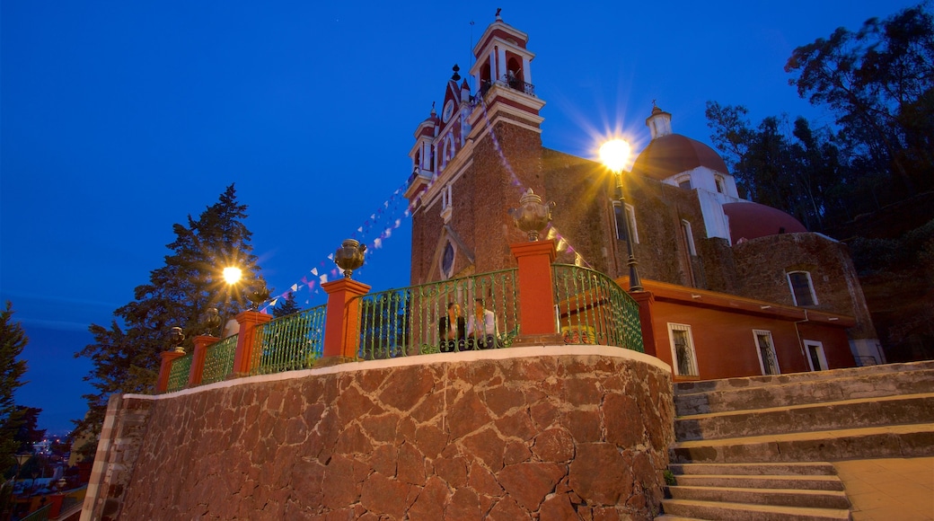 Metepec showing night scenes and a church or cathedral