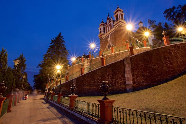 Metepec showing night scenes and a church or cathedral