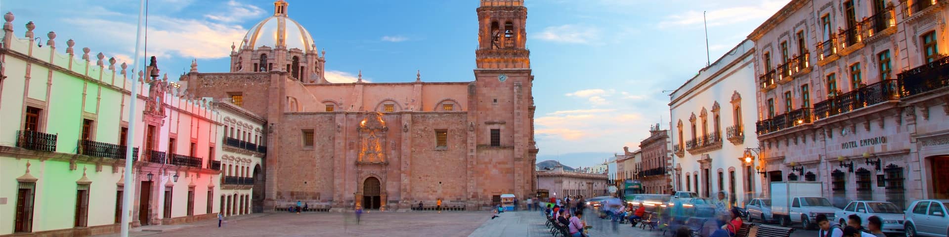 Mexico which includes heritage architecture and a square or plaza as well as a couple