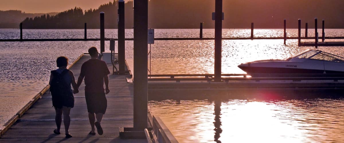 Harrison showing a sunset as well as a couple