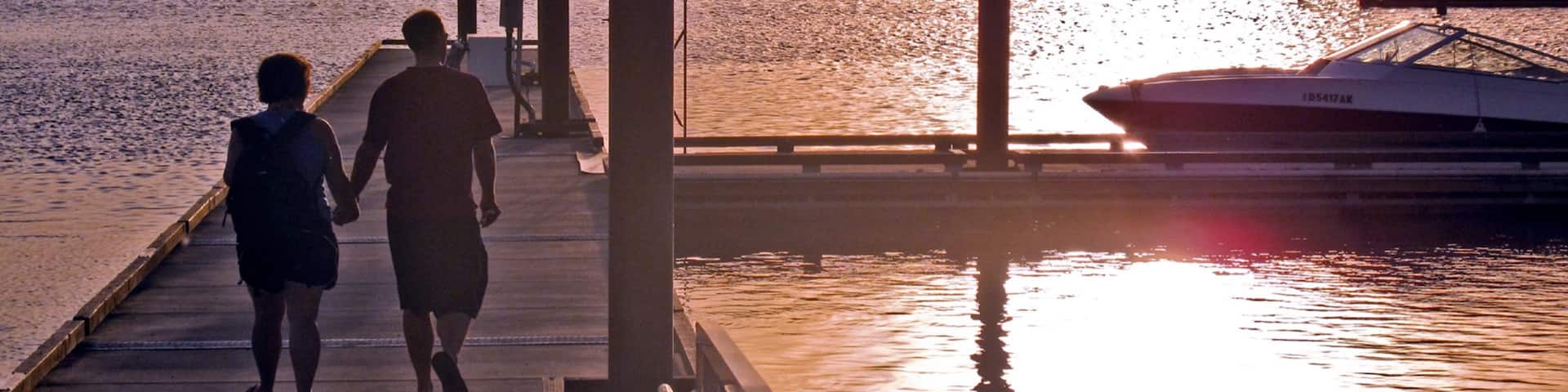 Harrison showing a sunset as well as a couple