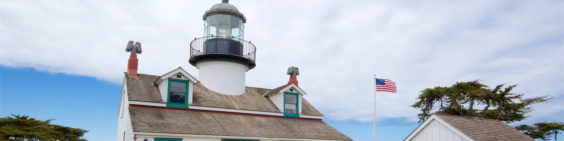 Point Pinos Lighthouse showing a lighthouse and general coastal views