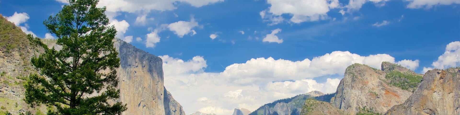 Tunnel View showing views and mountains as well as a large group of people