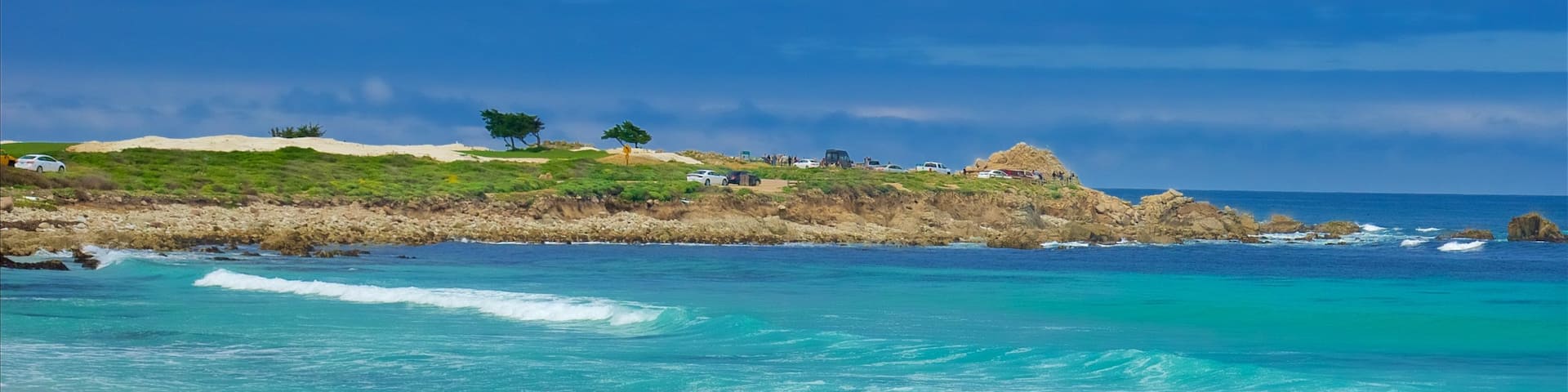 17-Mile Drive which includes rugged coastline and a beach