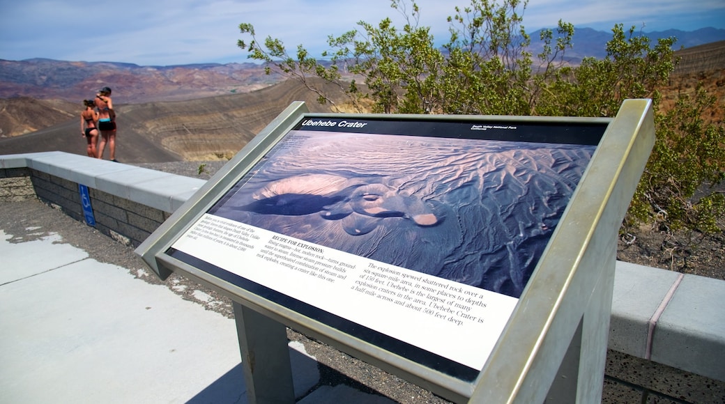 Death Valley which includes signage and tranquil scenes