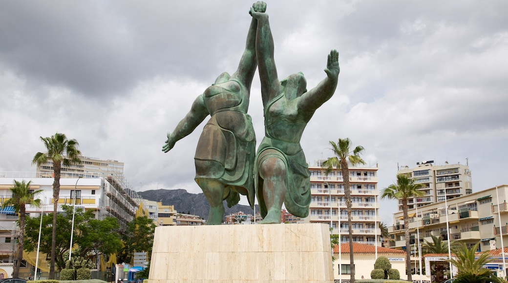 Torremolinos which includes a statue or sculpture