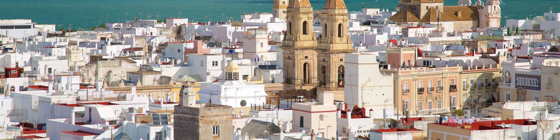 Torre Tavira showing a small town or village, general coastal views and a coastal town