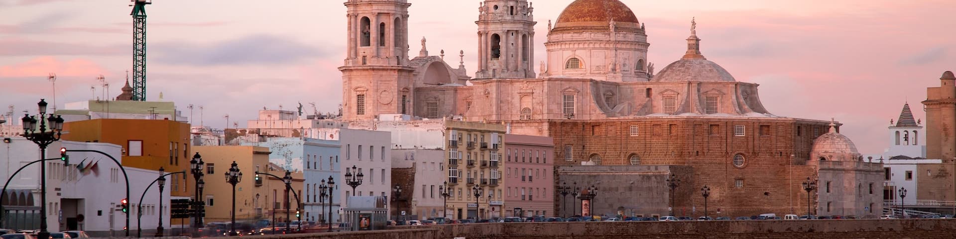 Catedral Nueva which includes rugged coastline, a city and general coastal views