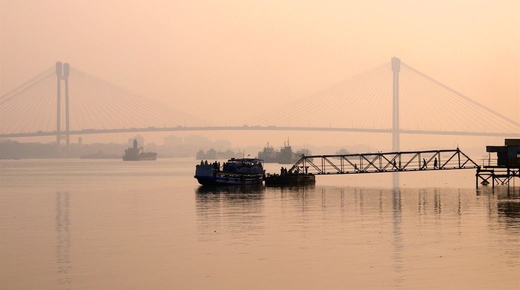 Botanical Gardens featuring boating, mist or fog and a sunset