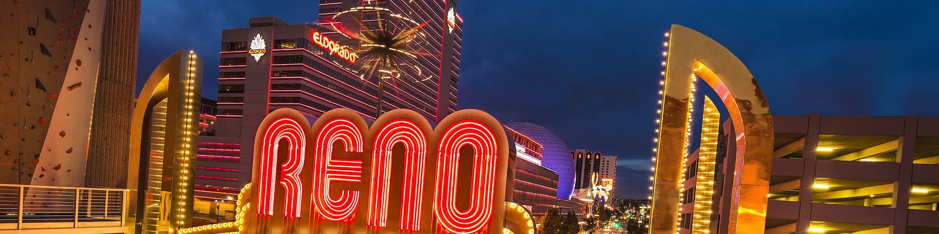 Sparks which includes night scenes, signage and a city