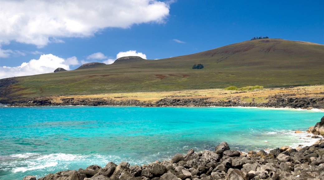 Easter Island which includes rugged coastline, mountains and general coastal views