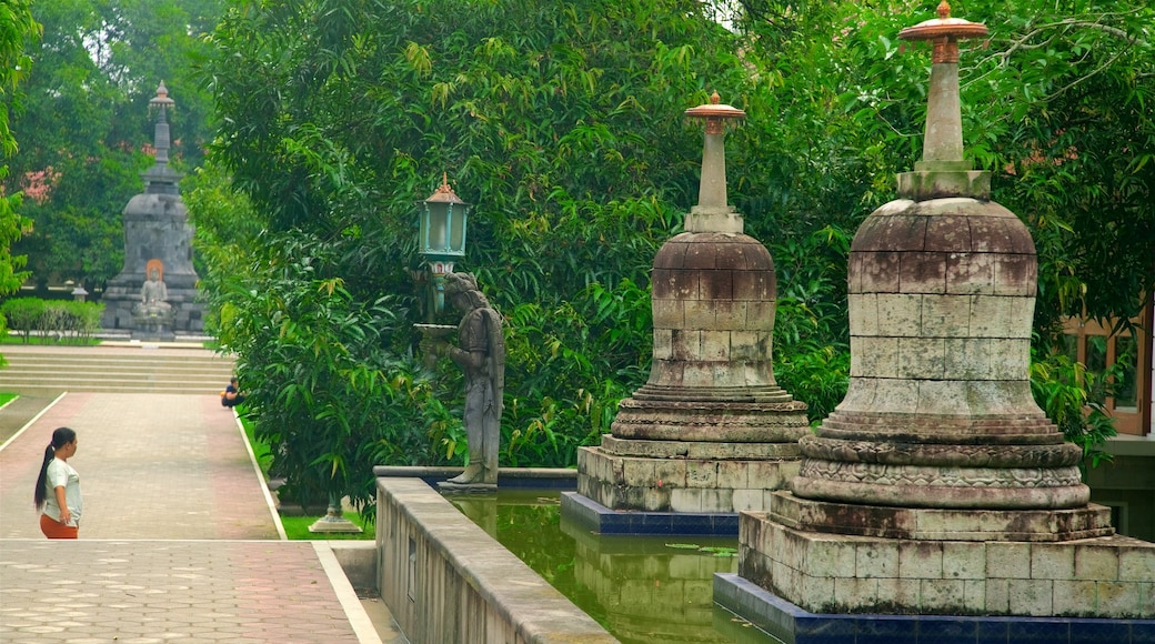 Magelang which includes a park, a statue or sculpture and heritage elements