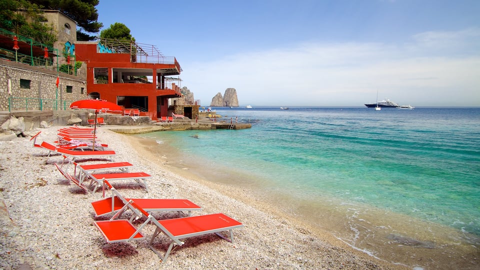 Marina Piccola featuring a pebble beach and a luxury hotel or resort