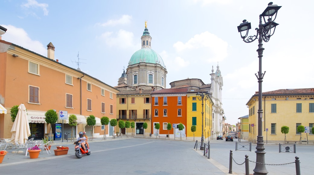 Cathedral of San Giovanni Battista which includes a church or cathedral, a square or plaza and a city