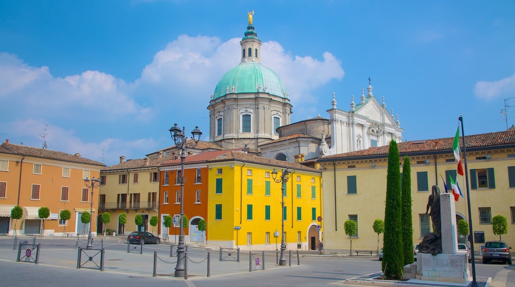 Cathedral of San Giovanni Battista showing a church or cathedral, a square or plaza and a city