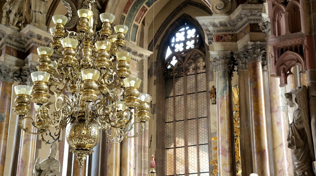 Cathedral of Bolzano featuring a church or cathedral and interior views