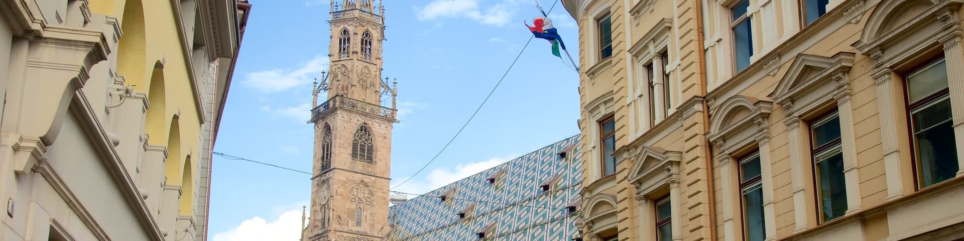 Cathedral of Bolzano which includes a church or cathedral and street scenes
