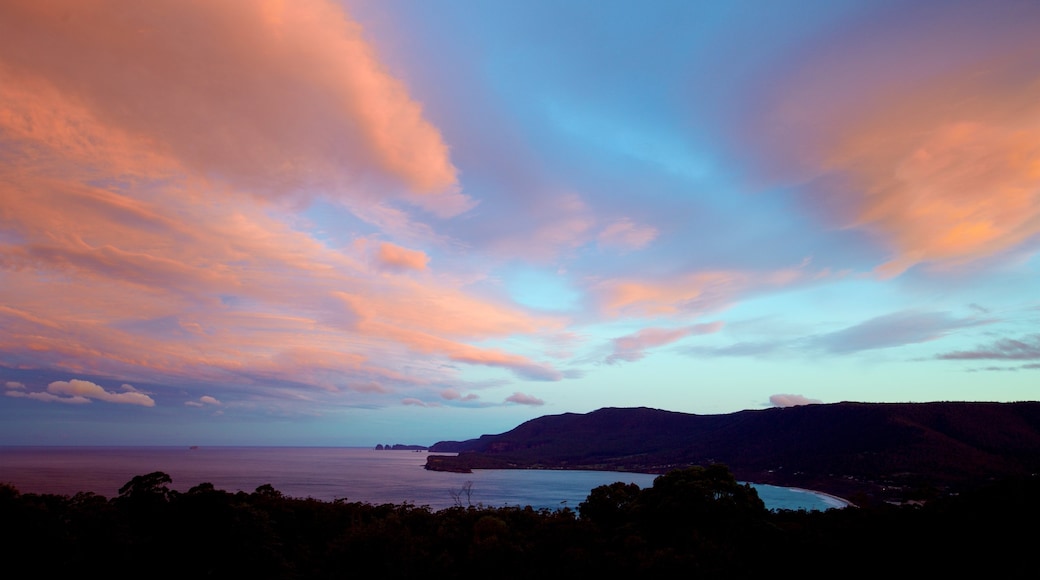 Tasman Peninsula featuring a bay or harbour, a sunset and landscape views