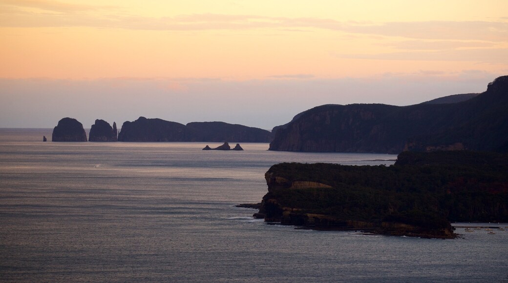 Tasman Peninsula showing rugged coastline and a sunset