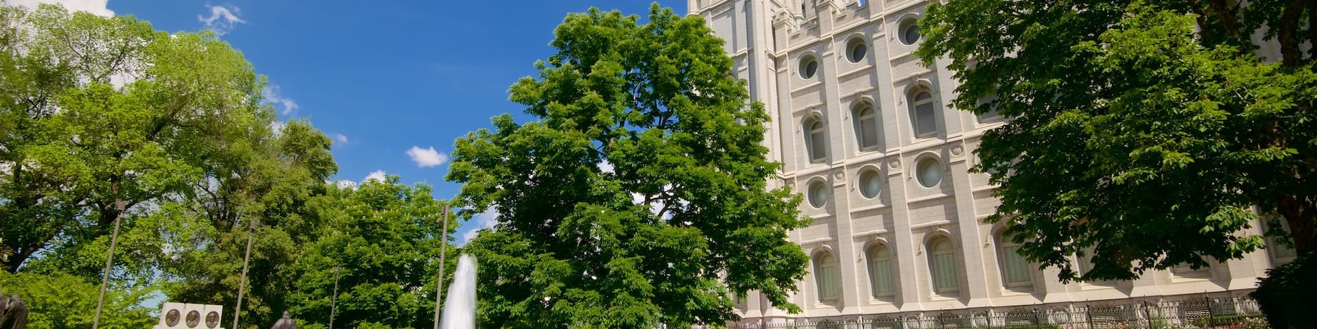 Temple Square which includes a fountain, heritage architecture and a garden