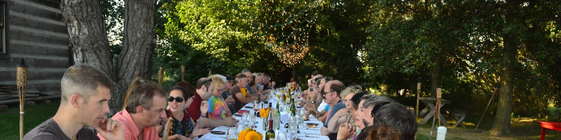 Champaign showing outdoor eating as well as a small group of people