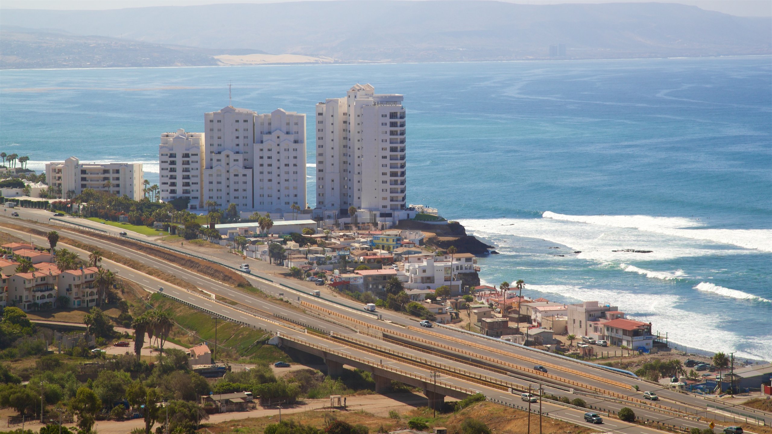 Rosarito showing landscape views, a coastal town and general coastal views