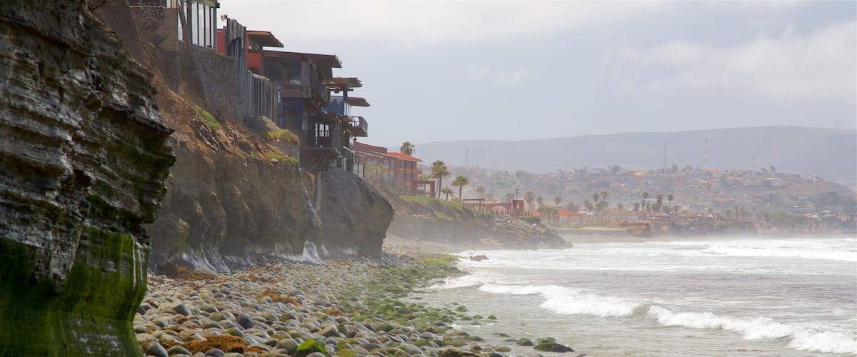 Rosarito showing general coastal views, rocky coastline and mist or fog