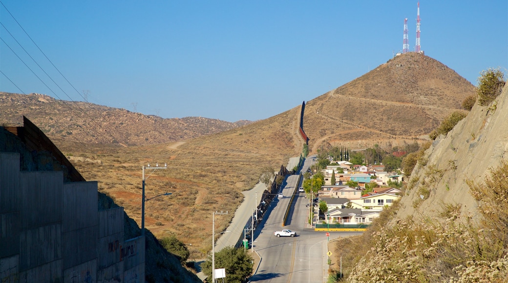 Tecate showing a small town or village, desert views and tranquil scenes