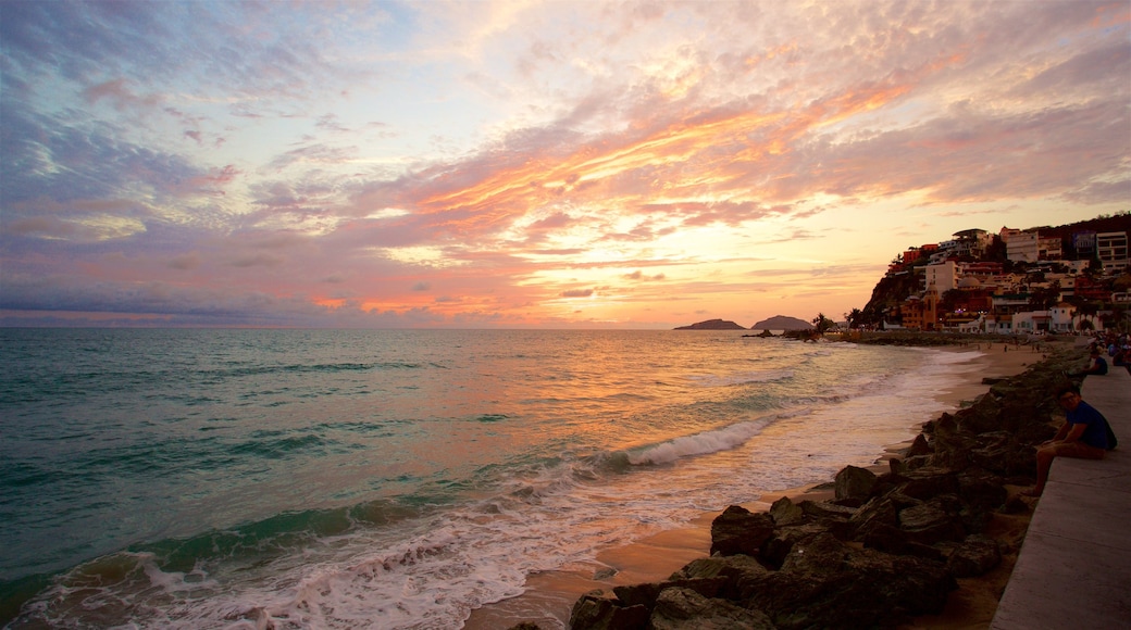 Mazatlan showing general coastal views, a sunset and a sandy beach