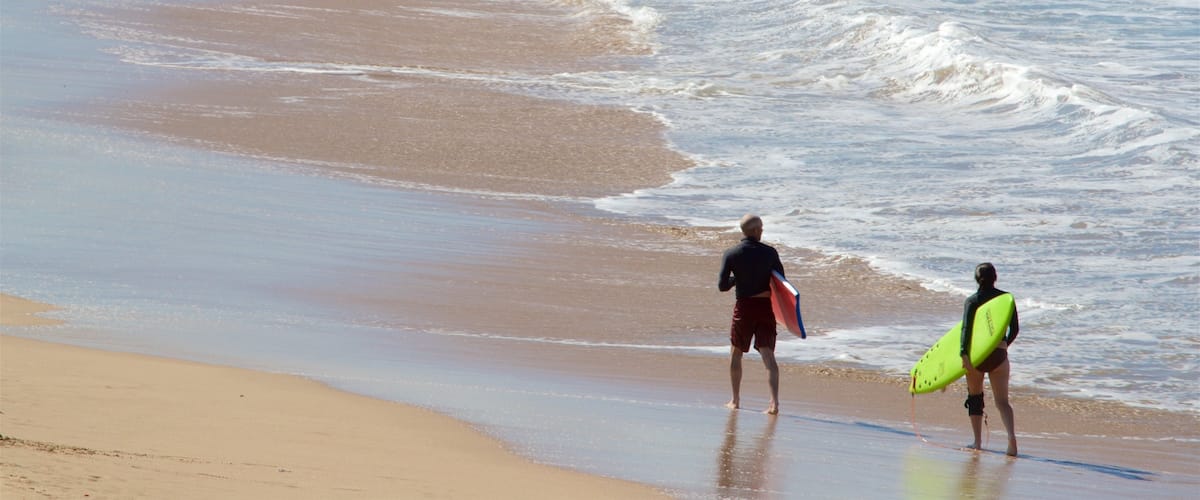 Witches Beach featuring a sandy beach, surfing and general coastal views