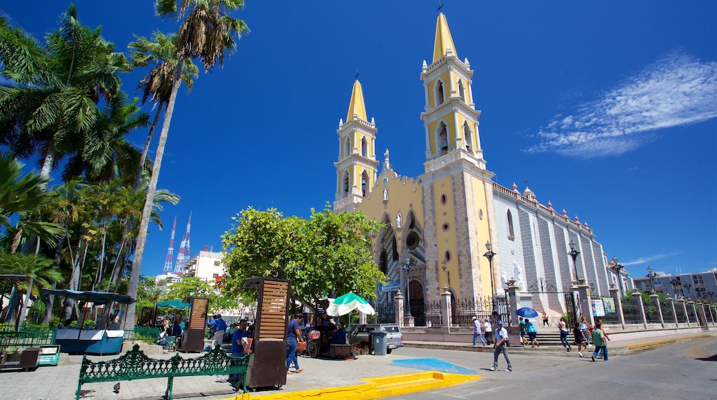 Immaculate Conception Cathedral showing a square or plaza and a church or cathedral