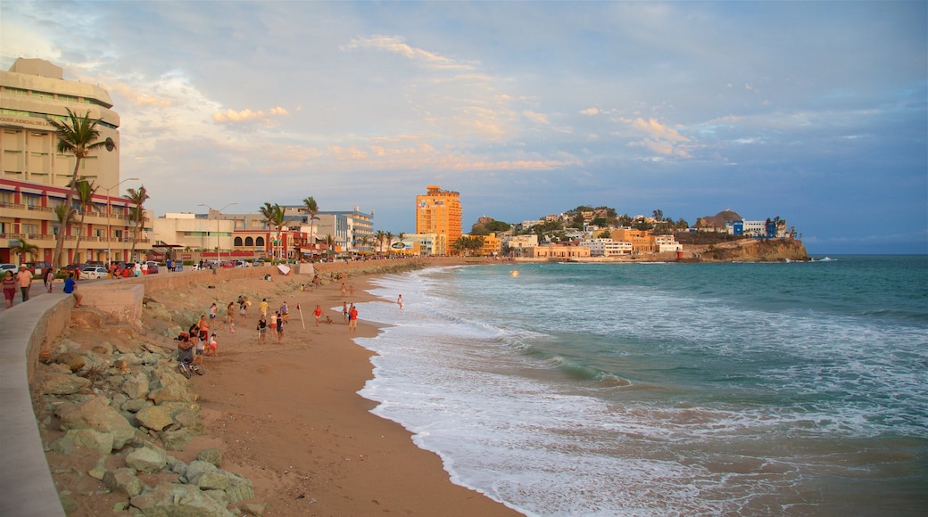 Olas Altas Beach showing general coastal views and a sandy beach