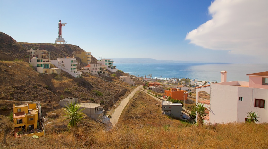 Rosarito que incluye una pequeña ciudad o pueblo y vistas generales de la costa