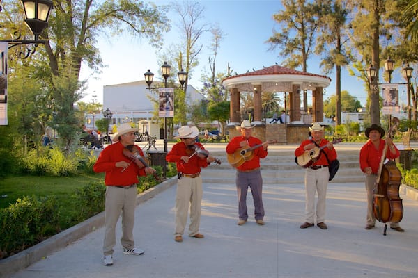 Tecate which includes a square or plaza as well as a small group of people