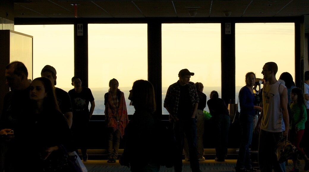 Prudential Tower featuring interior views and modern architecture as well as a large group of people