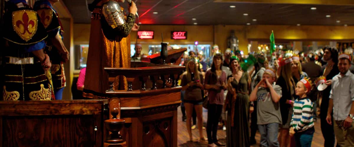 Medieval Times which includes performance art and interior views as well as a large group of people