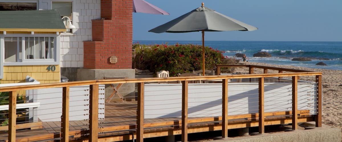Crystal Cove State Park showing general coastal views and a house