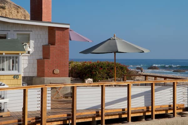 Crystal Cove State Park showing a house and general coastal views
