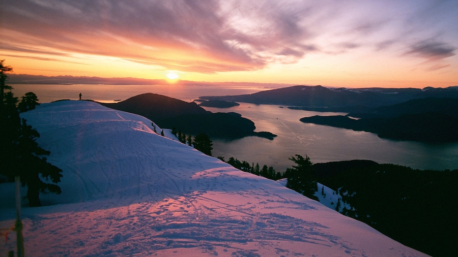 Cypress Mountain showing snow, a sunset and mountains