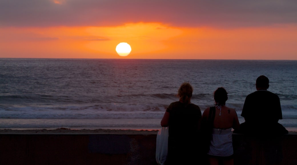 Pacific Beach Park showing a sunset, a beach and landscape views